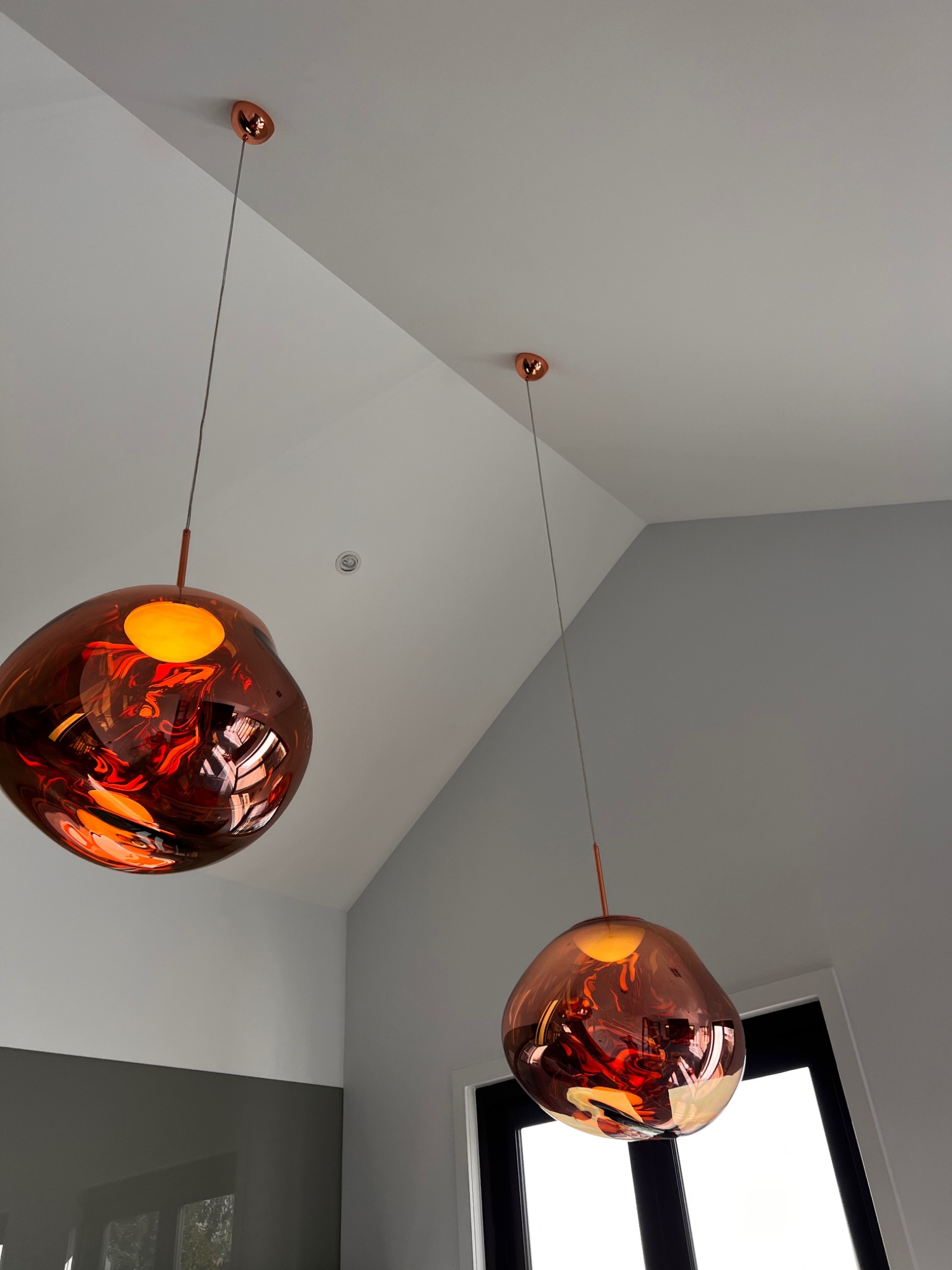 Copper pendant lighting installation